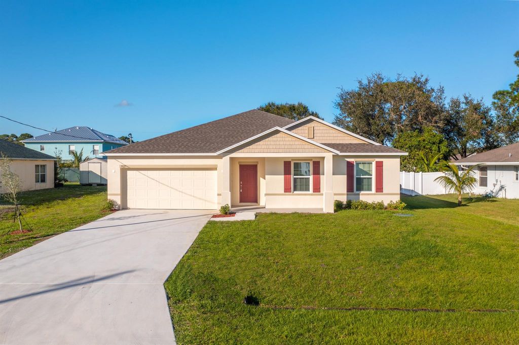 Photo of 5927 NW Brenda Circle, Port Saint Lucie, FL 34986 (MLS # R11046716)