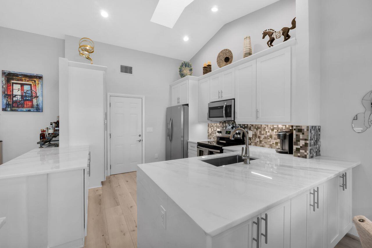 ST TROPEZ AT BOCA GOLF VILLAS CONDO - Residential