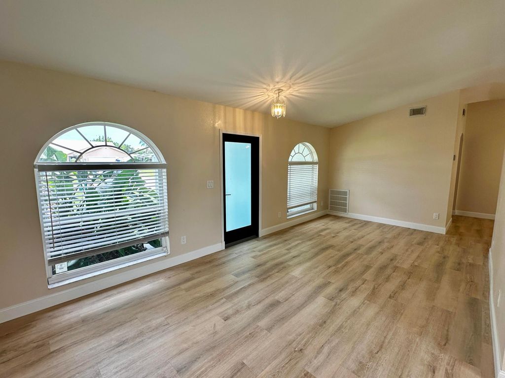 Photo of 385 SW Nativity Terrace, Port Saint Lucie, FL 34953 (MLS # R11011225)