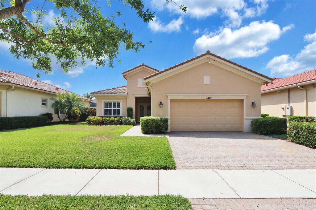 Photo of 9481 SW Nuova Way, Port Saint Lucie, FL 34986 (MLS # R10703270)