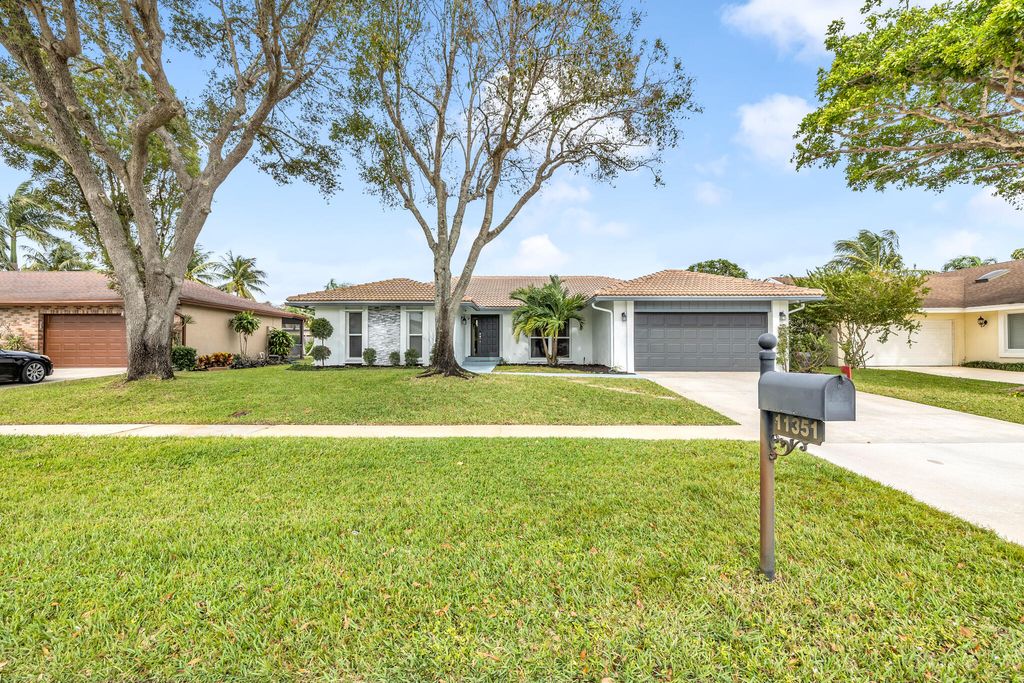 Photo of 11351 Woodchuck Drive, Boca Raton, FL 33428 (MLS # R10948810)