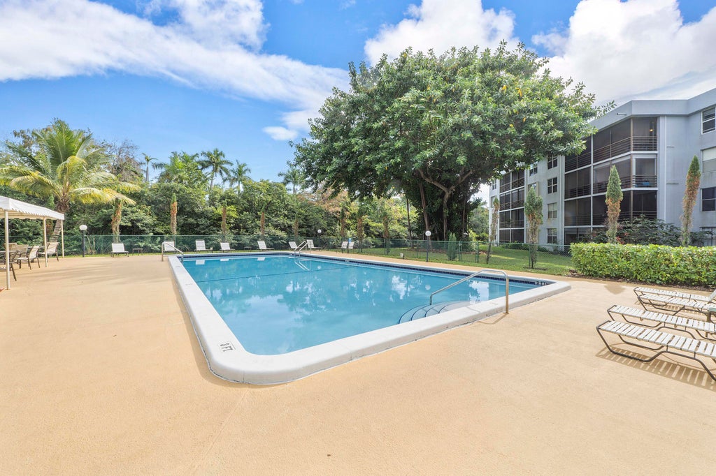 Photo of 113 ROYAL PARK Drive #1H, Oakland Park, FL 33309 (MLS # B26079449)