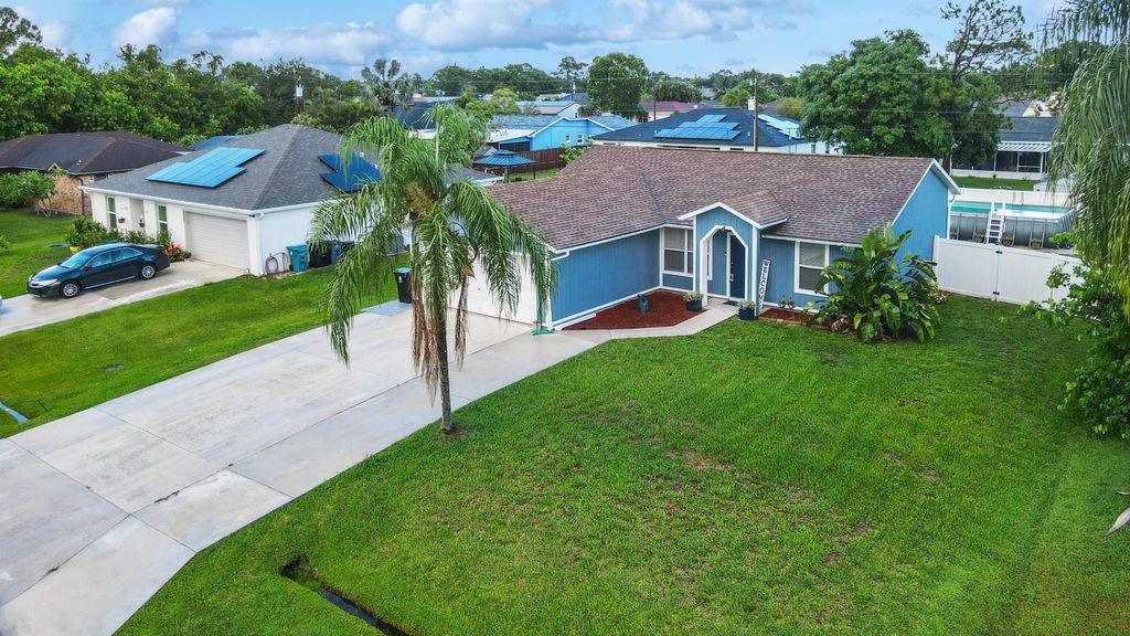 Photo of 2243 SE Haddon Street, Port Saint Lucie, FL 34984 (MLS # R11000768)