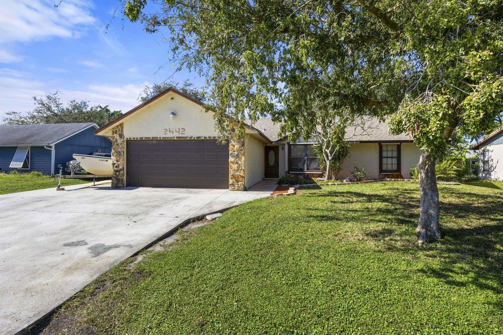 Photo of 2442 SW Lafayette Street, Port Saint Lucie, FL 34984 (MLS # R11092420)