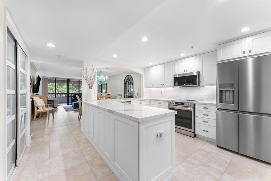 ABSOLUTELY GORGEOUS CONDO | RARELY AVAILABLE CORNER UNIT | FULLY REMODELED | 3 BALCONIES | PANORAMIC GOLF VIEWS | ALL INSPECTIONS & WORK COMPLETED | HIGHLY DESIRABLE THE GLENS | Bright Open Floor Plan | Split Bedroom Layout | Upgraded Flooring | Custom Blinds & Crown Molding | LED High Hat Lighting | Eat-In Kitchen | Quartz Counters, Soft-Close Cabinetry, NEW HIGH-END S/S APPLIANCES, Breakfast Nook, Bar | Primary Suite w/ Walk-In Closet, Private Balcony & En-Suite | 2nd Bedroom w/ Balcony | Den Can Easily Be Converted Back To 3rd Bedroom | In-Unit Laundry | Amenities Offer Clubhouse, Heated Pool & Spa, Fitness Center, Sauna, Billiards & BBQ Picnic Area | Prime Boca Raton Location | Minutes to Beaches, Boca Town Center, Mizner Park | ROOF 2023 | AC 2018 | WH Tankless