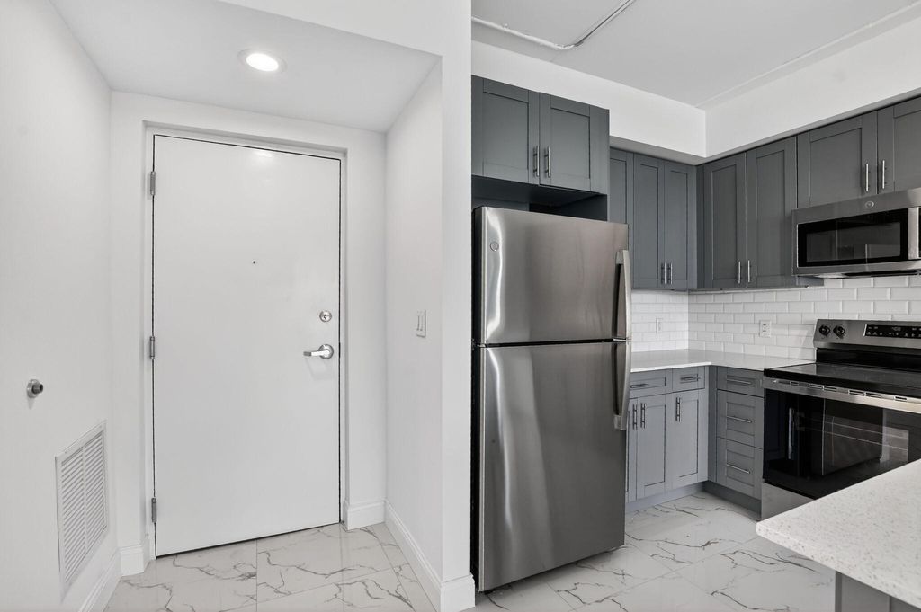 Photo of 350 W Hidden Valley Boulevard #101, Boca Raton, FL 33487 (MLS # R11168503)