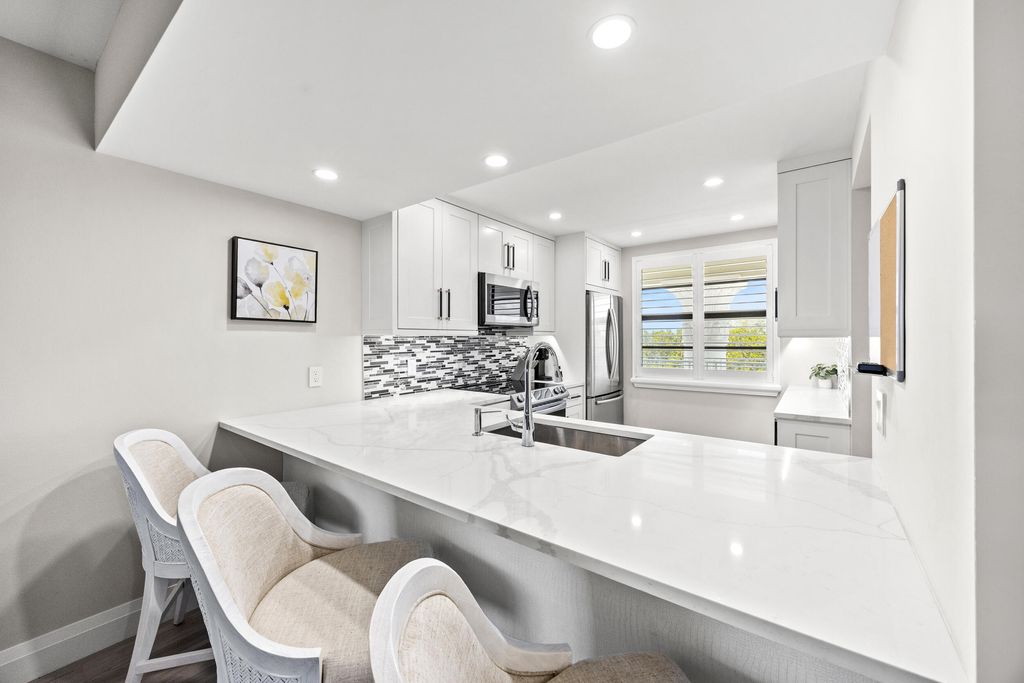 Photo of 6061 Balboa Circle #403, Boca Raton, FL 33433 (MLS # B26005645)