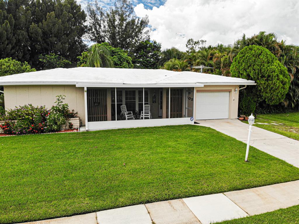 HEY! WONDERFUL 2/2/1 WITH DEN POOL HOME ! .34 ACRE LOT. UPDATED KITCHEN HAS WOOD CABINETS, SOFT CLOSE DRAWERS, GRANITE COUNTERS, TILE AND WOOD FLOORS THROUGHOUT. UPDATED BATHS. HUGE ENCLOSED FLORIDA ROOM. WATER SOFTNER SYSTEM. OVERSIZED PRIVATE BACKYARD WITH 2 SHEDS, MATURE TREES. ENJOY THE BIG 30'X19' ABOVE GROUND SPLASH POOL WITH REDWOOD DECK AND OUTDOOR SHOWER. BARREL TILE ROOF SEALED FOR LONGLIFE. PARTIAL SPRINKLER SYSTEM. CAMERA SECURITY SYSTEM INCLUDED!