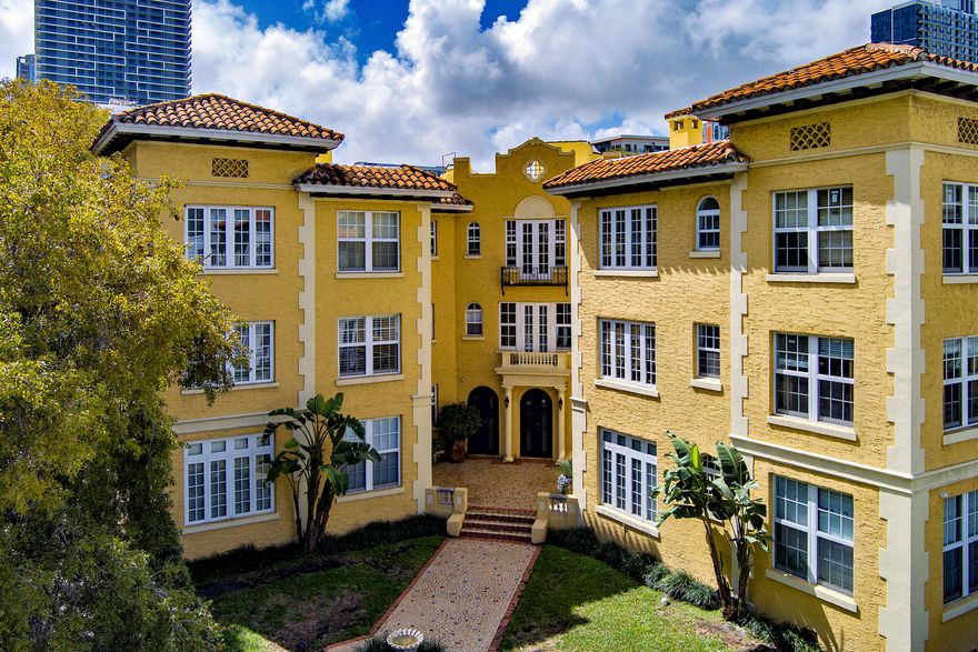 Welcome to Beverly Terrace Manors, a charming historic condo building located directly on Biscayne Boulevard in Miami in one of the city's fastest growing areas! This rarely available, centrally located condo offers a perfect combination of classic Miami architecture & convenient access to dining & shopping. Bright & inviting, this condo features spacious living areas, large windows with abundant natural light, & timeless architectural character rarely found in newer developments. Efficient layout makes it ideal for a primary residence, vacation property, or investment.  Ideally  located in Edgewater/Wynwood.  Unit located on top floor of 3 story building & includes central AC & private gated off street parking.  No elevator.  Fully Funded Reserves & Low Maintenance Fees of $305/month! You won't find a better value! Cash or private financing only in this boutique, Historic designated building in 2003; due to ownership percentage limitations and Fannie Mae rules.  Architects: Hampton and Ehmann Date Designated: 2003  Built in 1925 at the height of the Land Boom, this Mediterranean Revival style condo building is an impressive reminder of Biscayne Boulevard's heyday.