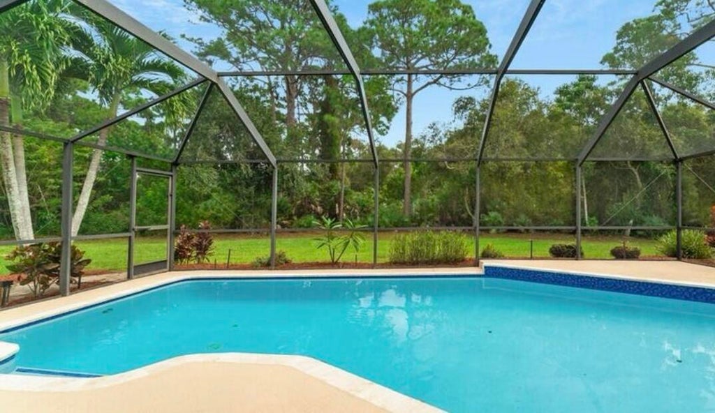 Photo of 2897 SE Italy Street, Port Saint Lucie, FL 34952 (MLS # B26092818)