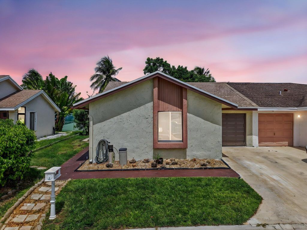 Photo of 9667 Sunny Isle Circle, Boca Raton, FL 33428 (MLS # B26024013)