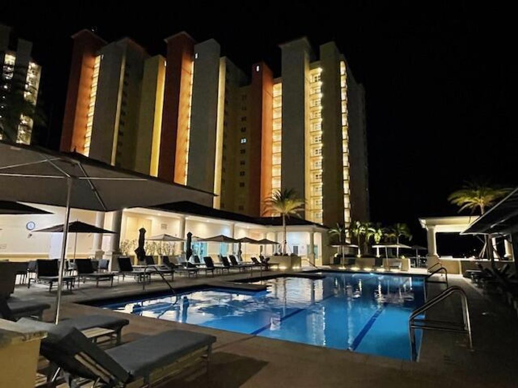 Photo of 2650 Lake Shore Drive #1204, Riviera Beach, FL 33404 (MLS # R11117409)