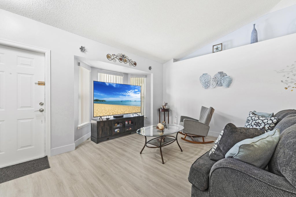 Photo of 282 SE WALSH Terrace, Port Saint Lucie, FL 34983 (MLS # B26070163)