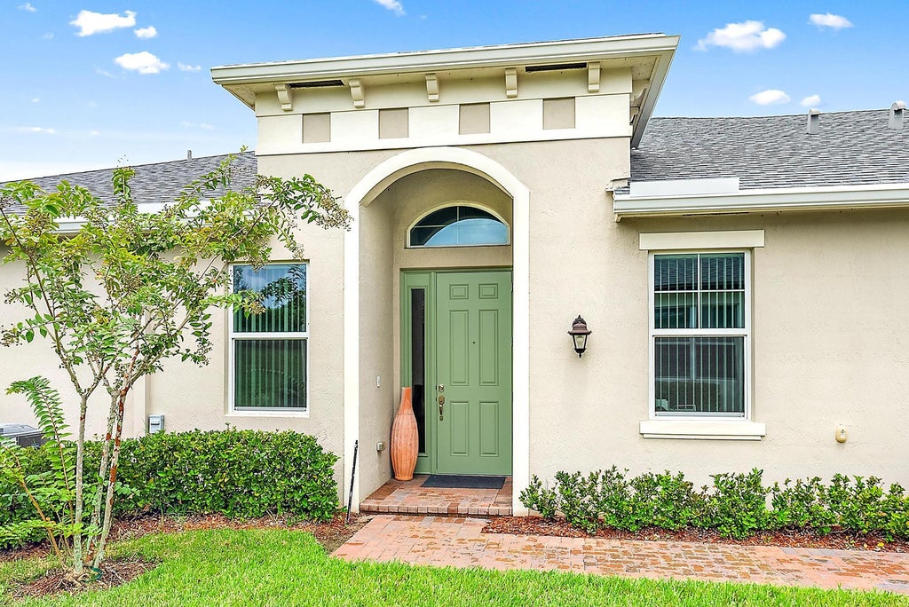 Photo of 12922 SW Lake Fern Circle, Port Saint Lucie, FL 34987 (MLS # R11015865)