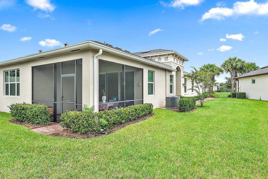 Photo of 12922 SW Lake Fern Circle, Port Saint Lucie, FL 34987 (MLS # R11015865)