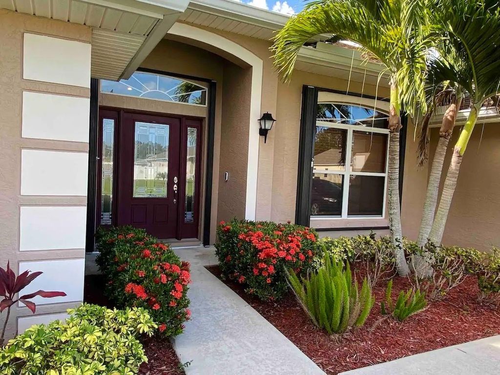 Photo of 1041 SW John Maccormack Terrace, Port Saint Lucie, FL 34953 (MLS # F10506843)