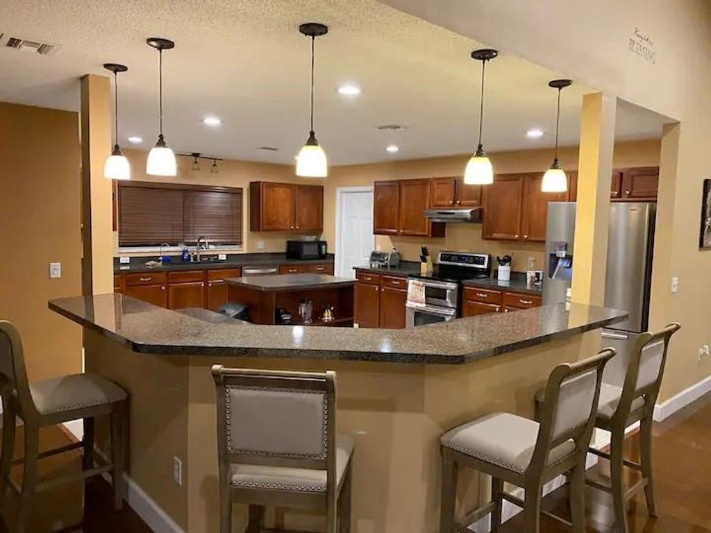 Photo of 1041 SW John Maccormack Terrace, Port Saint Lucie, FL 34953 (MLS # F10506843)