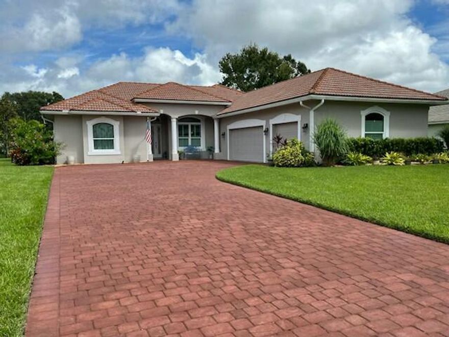 Fantastic 4/3/3 pool home located on an estate lot. Beautifully upgraded and meticulously maintained this home will not disappoint. Spacious living area with both a family room and formal living area. The custom kitchen has stainless steel appliances a large island and beautiful granite countertops. Two of the guest bedrooms are ensuite perfect for guests. Screened in saltwater, heated pool with covered Lani and cabana bathroom, a perfect place for entertaining. Expansive 3 car garage with epoxy floor. Impact windows with plantation shutters throughout. The home overlooks a canal for extra privacy. This home has many upgrades and is a must see. Come enjoy country club living in the beautiful Meadowood community.