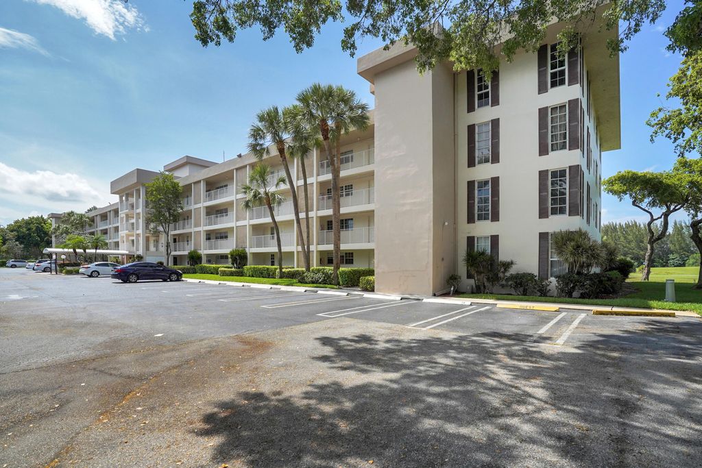 Photo of 3351 S Palm Aire Drive #104, Pompano Beach, FL 33069 (MLS # R11021971)