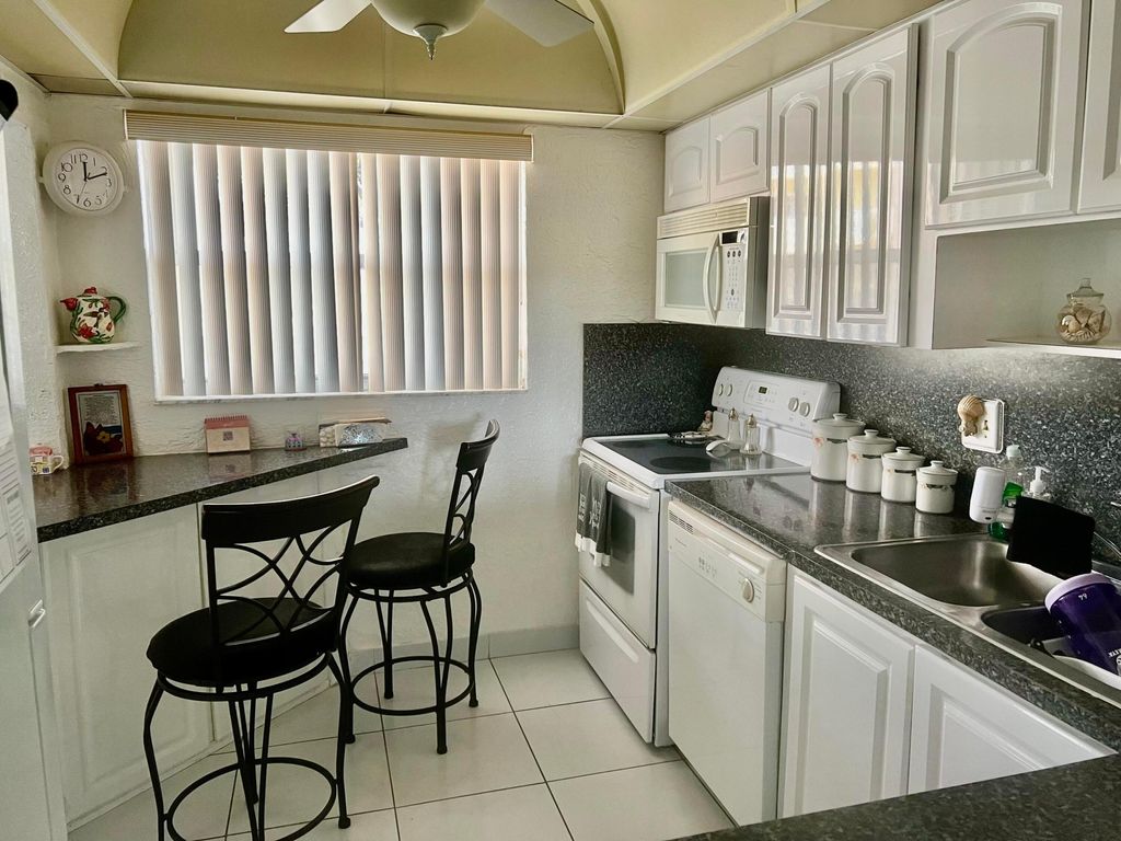 Photo of 6670 Royal Palm Boulevard #110, Margate, FL 33063 (MLS # B26015203)