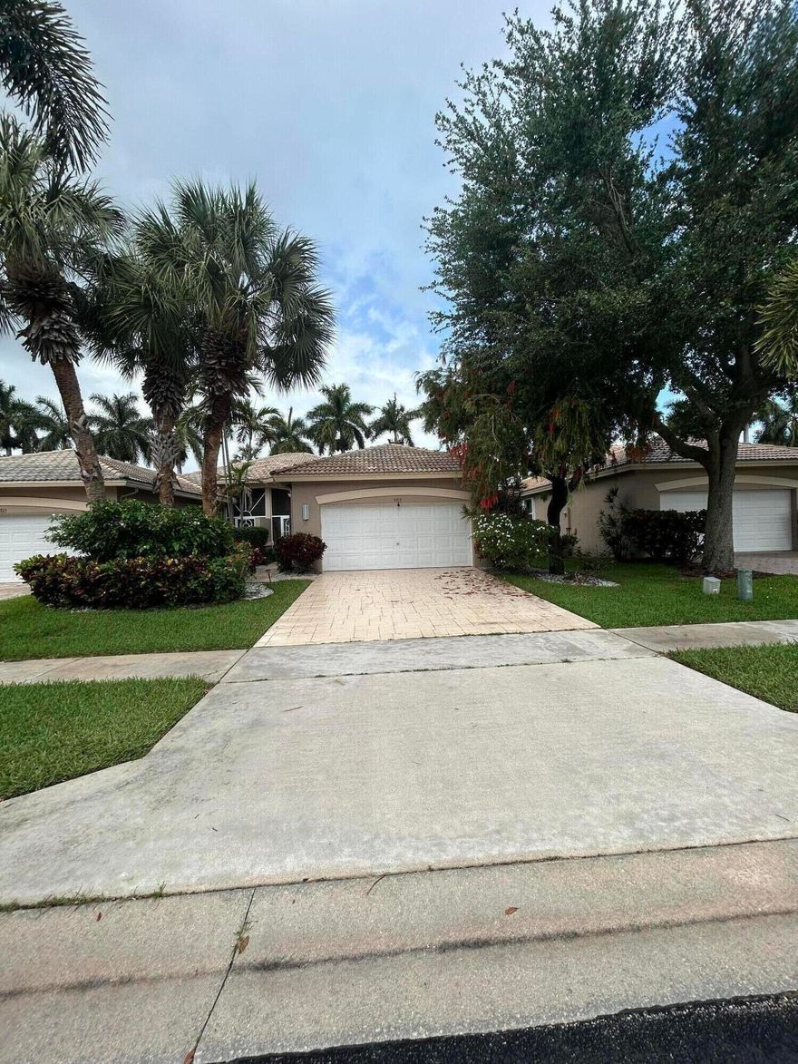 Pristine 3BR/2BA villa in highly desirable Palm Isles West—rare opportunity! Bright open floor plan with high ceilings and recessed lighting. Updated baths with granite, dual sinks, Roman tub, and separate shower. Tile in main areas, carpet in bedrooms. Eat-in kitchen, interior laundry, attached garage, and extended driveway. Primary includes California-style closets. Screened patio for relaxing. Resort-style community with pools, indoor heated pool, new auditorium, shows, activities, and on-site restaurant. Move-in ready—priced to sell and will not last! Schedule your showing today before it's gone.