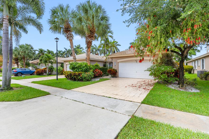 Pristine 3BR/2BA villa in highly desirable Palm Isles West—rare opportunity! Bright open floor plan with high ceilings and recessed lighting. Updated baths with granite, dual sinks, Roman tub, and separate shower. Tile in main areas, carpet in bedrooms. Eat-in kitchen, interior laundry, attached garage, and extended driveway. Primary includes California-style closets. Screened patio for relaxing. Resort-style community with pools, indoor heated pool, new auditorium, shows, activities, and on-site restaurant. Move-in ready—priced to sell and will not last! Schedule your showing today before it's gone.