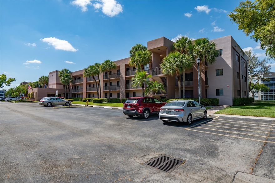 Discover this beautifully updated 2/2 condo in Ashmont at Kings Point, a premier 55+ community in Tamarac! This top-floor (3rd) corner unit offers breathtaking north-facing lake views, showcasing both sunrises and sunsets with the sun always behind you. Enjoy a custom-updated kitchen & bathrooms, meticulously designed and executed, plus new full-size washer & dryer, new stainless appliances, new water heater, newer AC (2022), under-sink water filtration and a screened balcony to soak in the serene surroundings. Just a short walk to the community pool, plus access to Kings Point’s incredible amenities, including a theater, heated pools, fitness center and courtesy busses plus a wide variety of social activities and more.