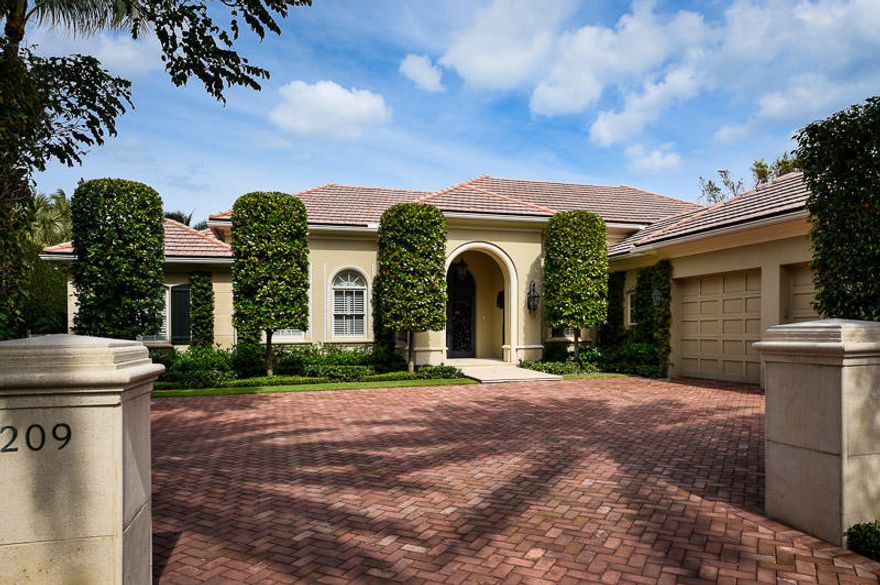 Nestled in the private Phipps Estates, this one story residence is situated on a beautiful lot.  The home was recently renovated wit beautiful architectural details and perfect proportions.  High hedges and lush landscaping give this estate a true Palm Beach feel.