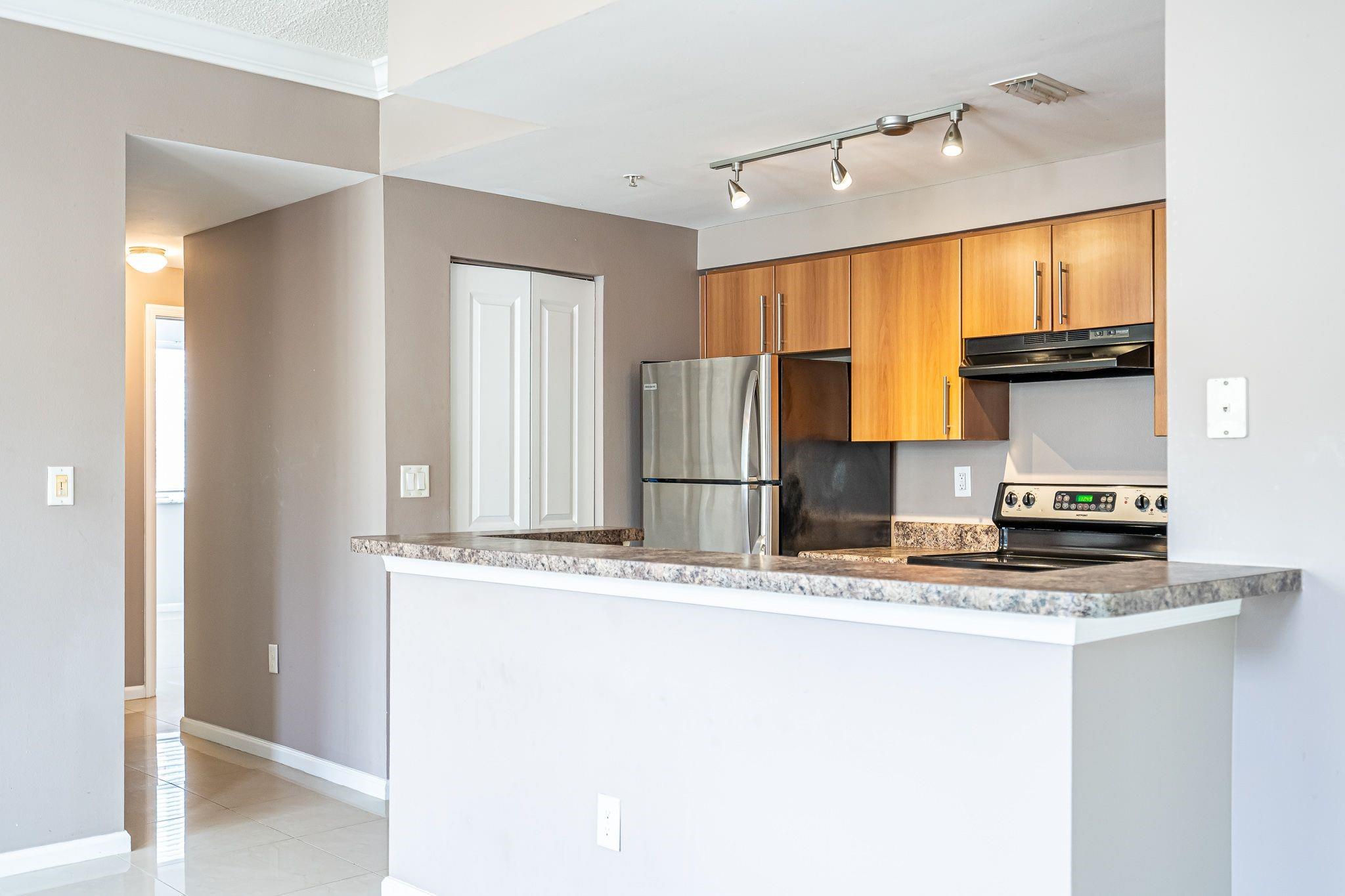 EL-AD POINCIANA PLACE - Residential Lease