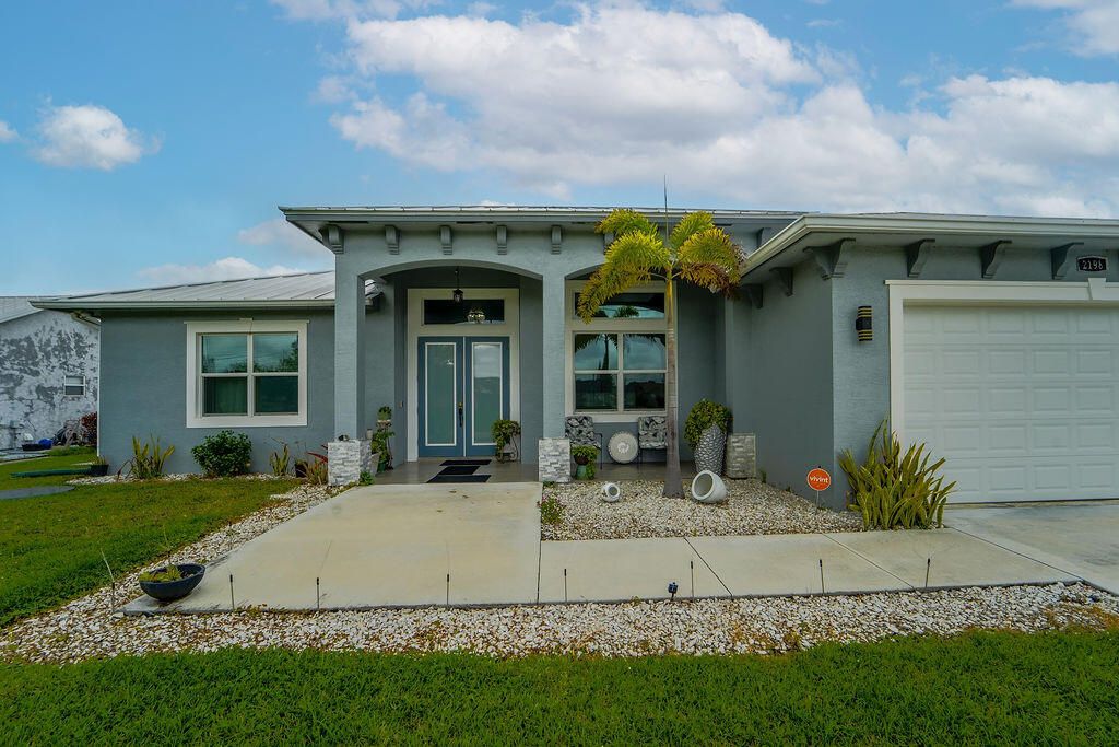 Photo of 2198 SW Alminar Street, Port Saint Lucie, FL 34953 (MLS # B26014217)