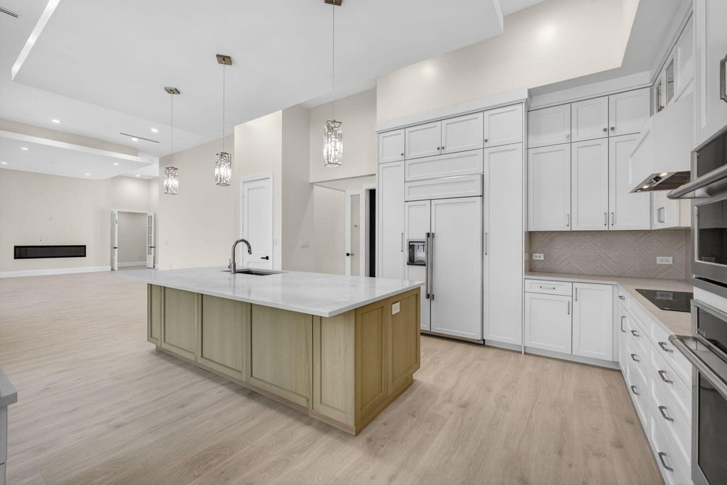 Photo of 8771 Man O War Road, Palm Beach Gardens, FL 33418 (MLS # B26009242)