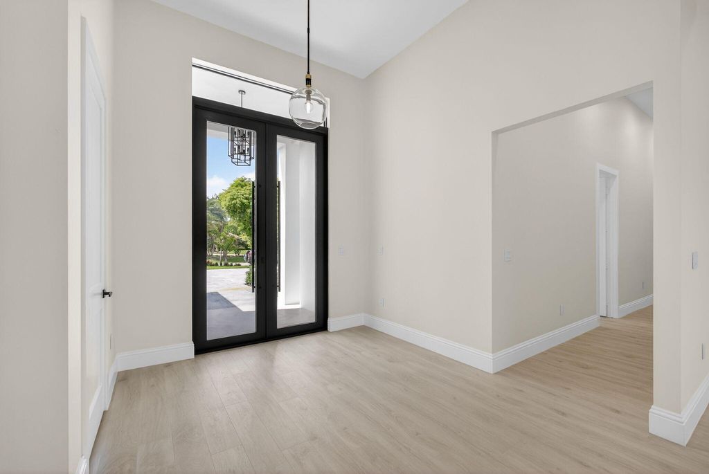 Photo of 8771 Man O War Road, Palm Beach Gardens, FL 33418 (MLS # B26009242)