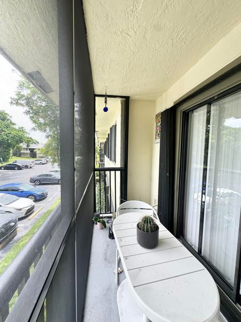 Tiny photo for 588 Trace Circle #211, Deerfield Beach, FL 33441 (MLS # B26050595)