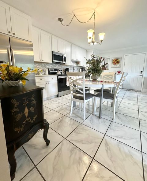 Tiny photo for 588 Trace Circle #211, Deerfield Beach, FL 33441 (MLS # B26050595)