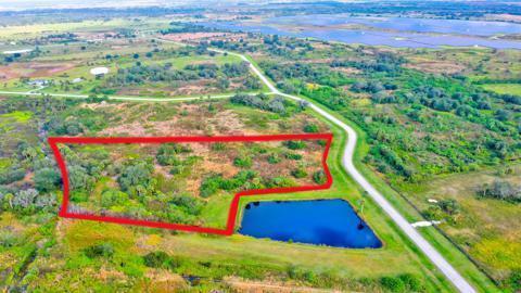 Welcome to Sherman Wood Ranches, an exclusive gated equestrian community where privacy meets tranquility. This remarkable 7.13-acre waterfront property is a canvas ready for your dream home. With underground utilities in place and beautifully maintained paved roads, the lot is fully prepared for your vision.Enjoy the unparalleled lifestyle offered by this prestigious neighborhood. Bridle trails wind through the community, providing the perfect setting for equestrian enthusiasts. Just minutes away, Lake Okeechobee invites you to indulge in world-class fishing, boating, and awe-inspiring natural beauty.Convenience blends seamlessly with serenity here. Downtown Okeechobee's dining, shopping, and entertainment are all within easy reach, while nearby cities offer even more amenities.