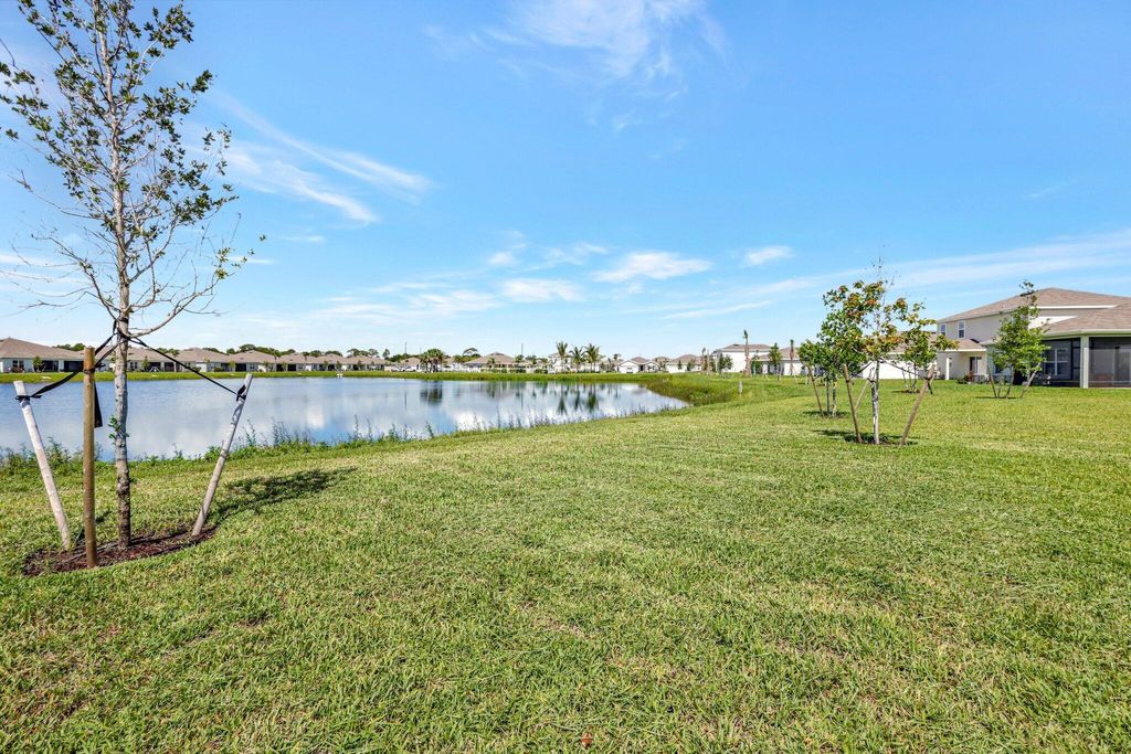 Photo of 104 Pummelo Place, Fort Pierce, FL 34981 (MLS # R10998738)