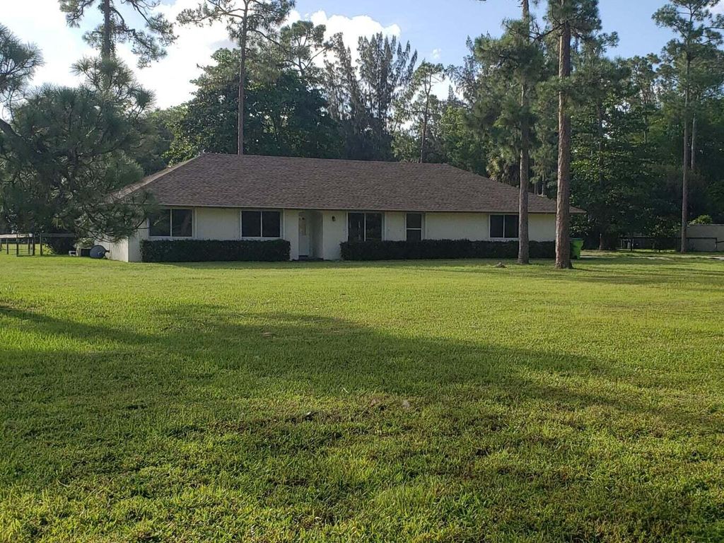 Photo of 1031 Hyde Park Road, Loxahatchee Groves, FL 33470 (MLS # R11161839)