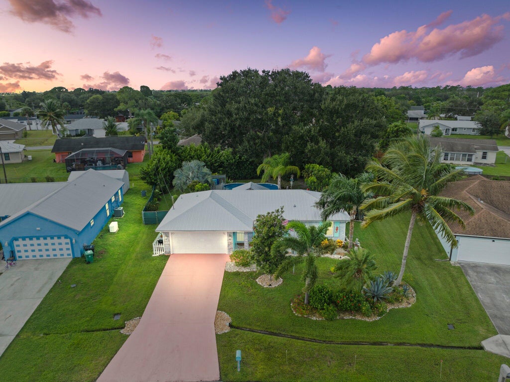 Photo of 2114 SE Midtown Road, Port Saint Lucie, FL 34952 (MLS # R11028452)