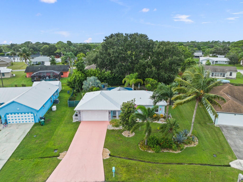 Photo of 2114 SE Midtown Road, Port Saint Lucie, FL 34952 (MLS # R11028452)
