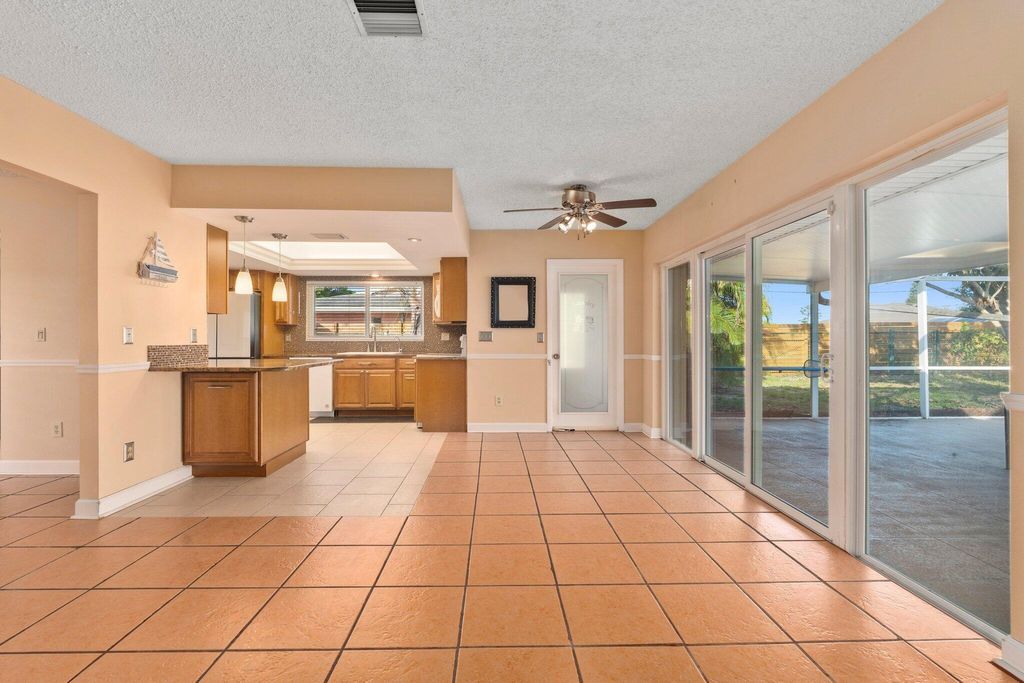 Photo of 184 NE Caprona Avenue, Port St Lucie, FL 34983 (MLS # R11096405)