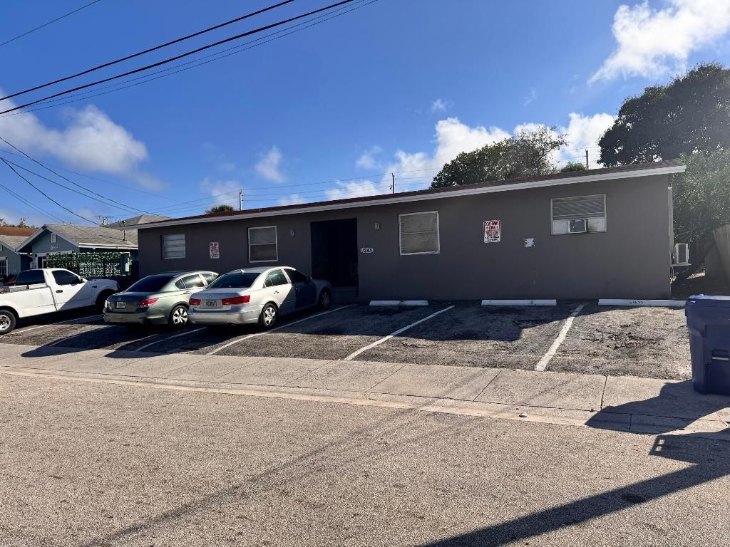 Photo of 1245 W 35th Street, Riviera Beach, FL 33404 (MLS # R11157414)