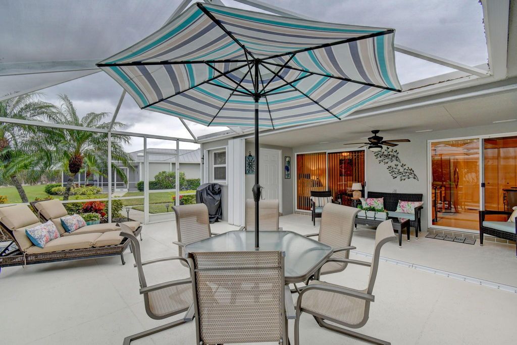 Photo of 1553 SW Waterfall Boulevard, Palm City, FL 34990 (MLS # R10948702)