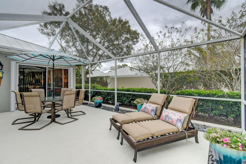 Photo of 1553 SW Waterfall Boulevard, Palm City, FL 34990 (MLS # R10948702)