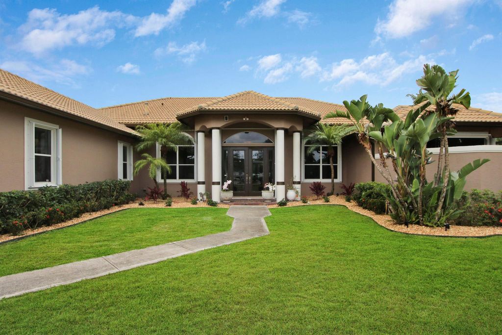 Photo of 7890 165th Street N, Palm Beach Gardens, FL 33418 (MLS # R10885161)