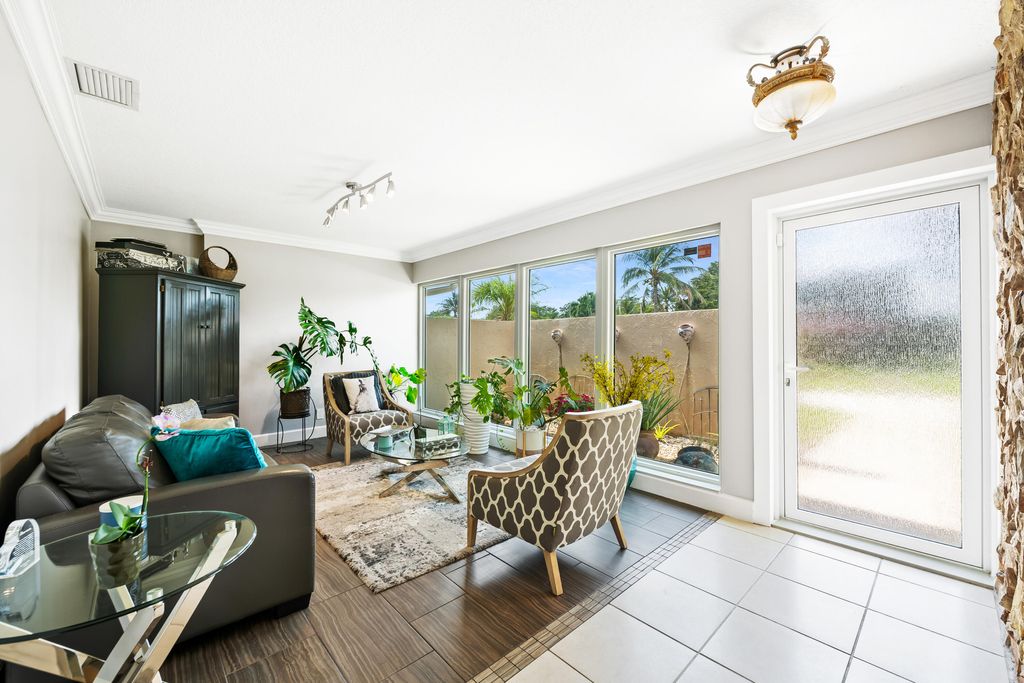 Photo of 10751 NW 43rd Court, Coral Springs, FL 33065 (MLS # B26033636)