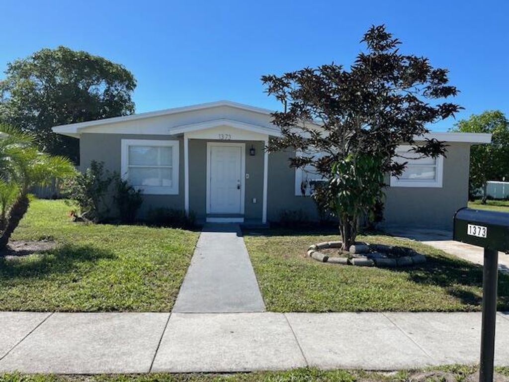 Photo of 1373 W 30th Street, Riviera Beach, FL 33404 (MLS # R11131851)