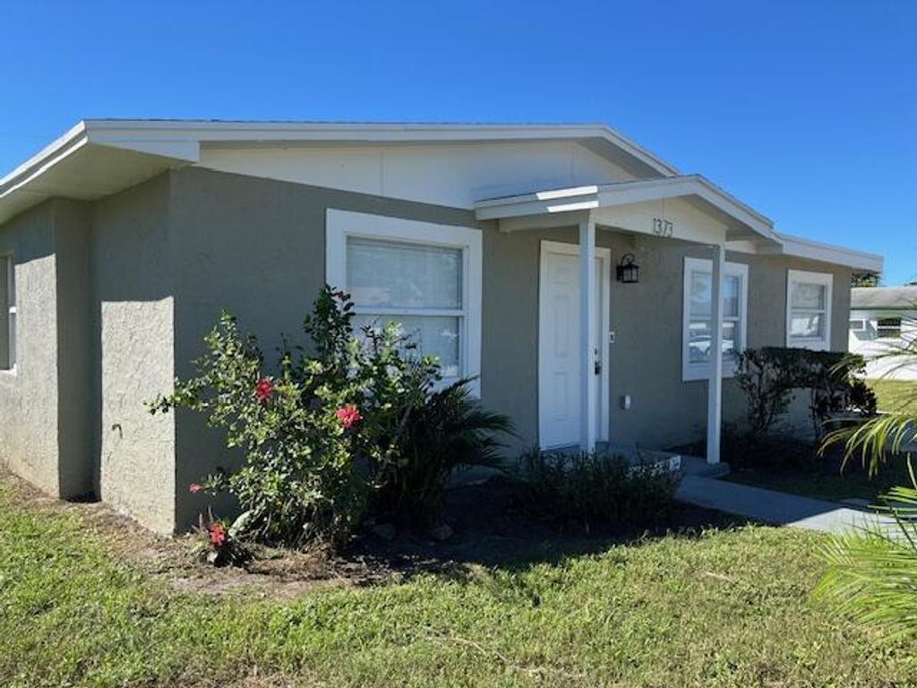 Photo of 1373 W 30th Street, Riviera Beach, FL 33404 (MLS # R11131851)