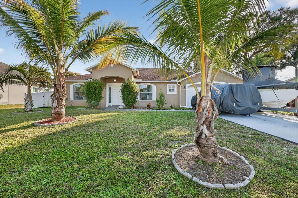 Photo of 1121 SW Ivanhoe Street, Port Saint Lucie, FL 34983 (MLS # R11157125)