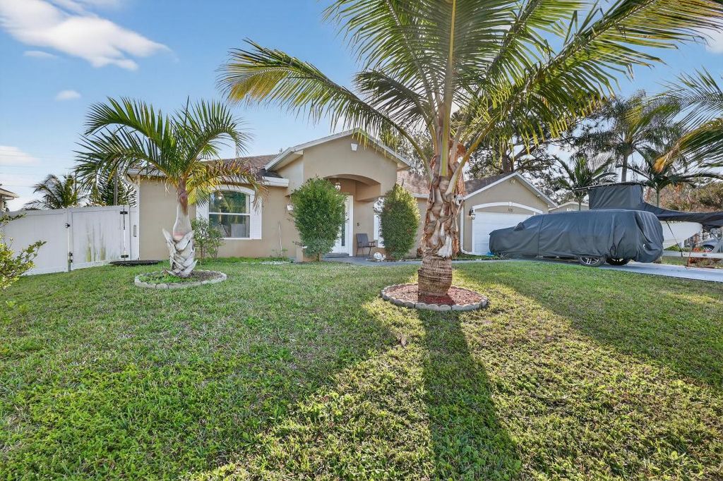 Photo of 1121 SW Ivanhoe Street, Port Saint Lucie, FL 34983 (MLS # R11157125)