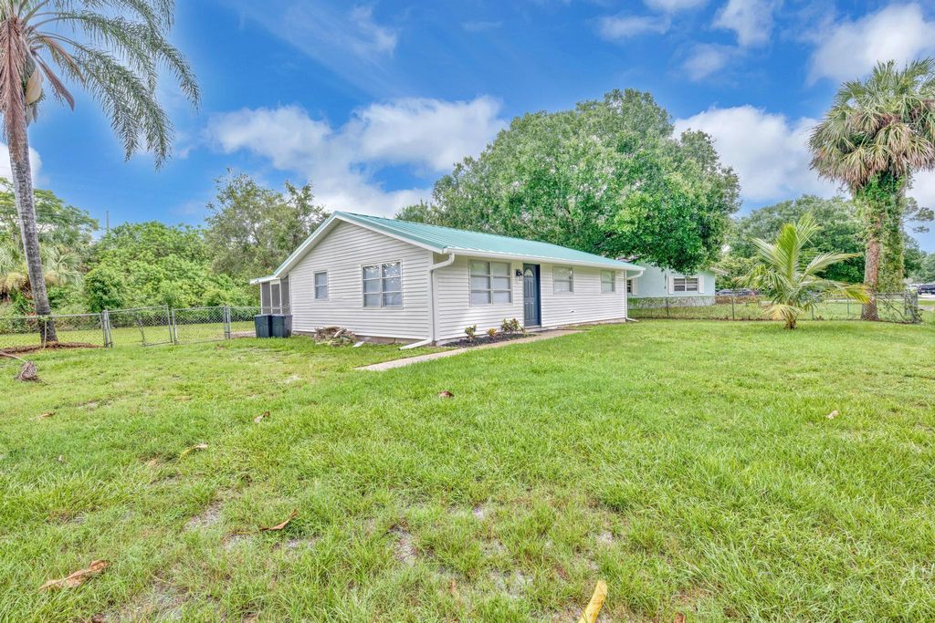 Photo of 6904 Penny Lane, Fort Pierce, FL 34951 (MLS # R10905566)